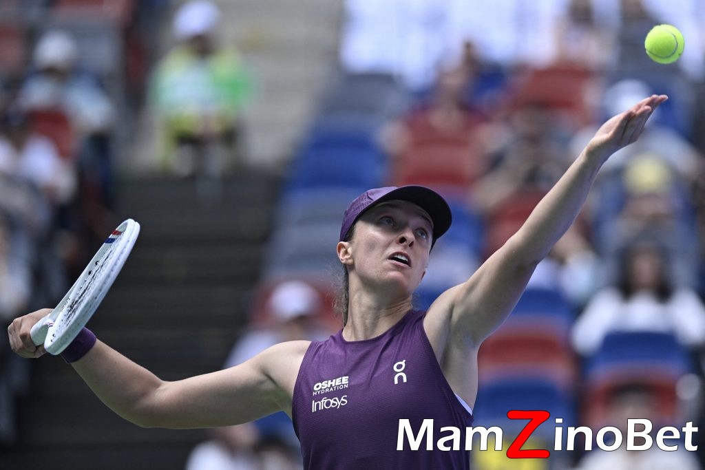 AFP__20261014__D37X24Q__v1__HighRes__TennisWtaChn-scaled-1-1024x683 Swiatek cruises past fellow Pole Frech to make winning start in Wuhan